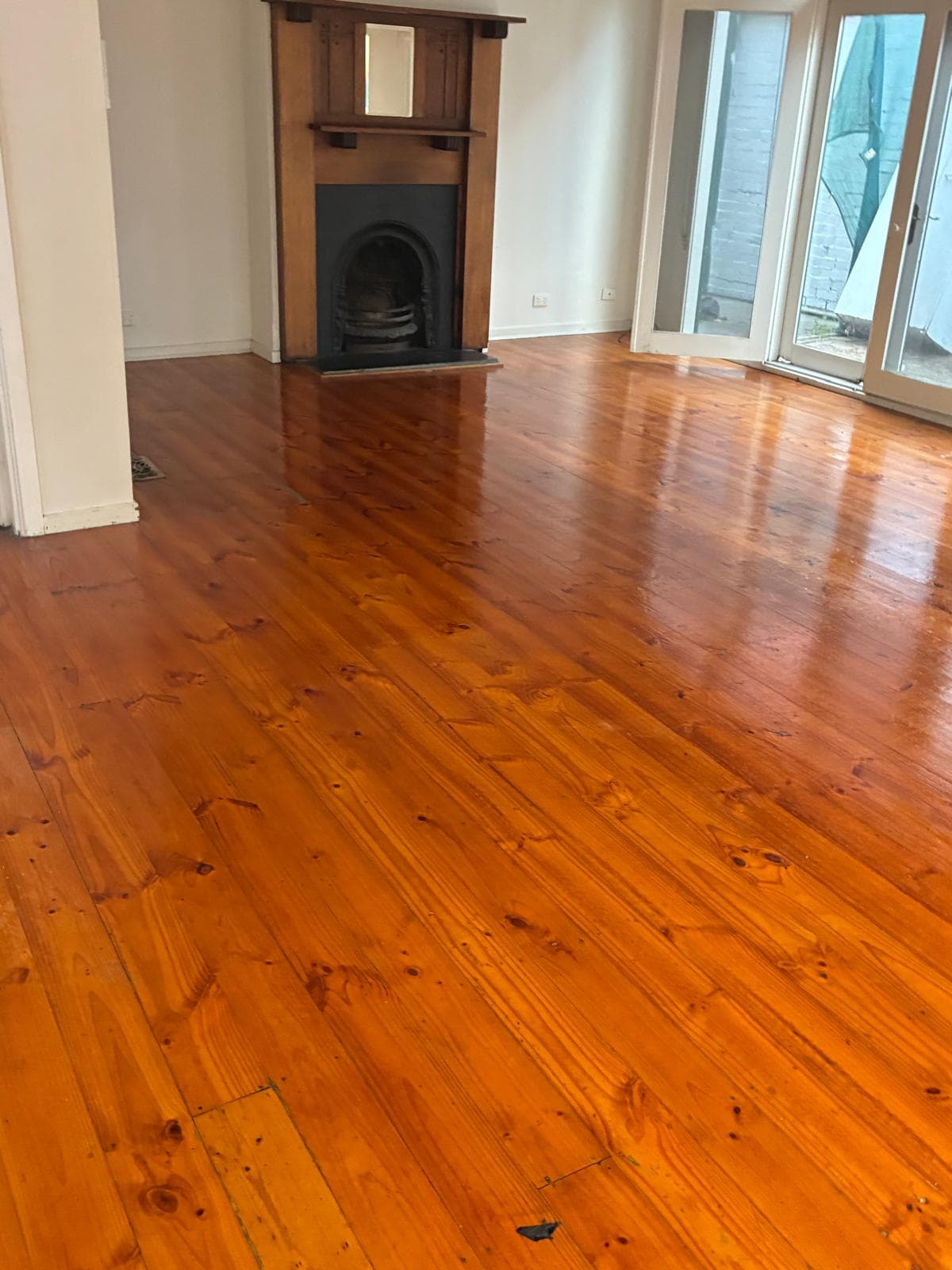 Polished timber floors gleaming after clean